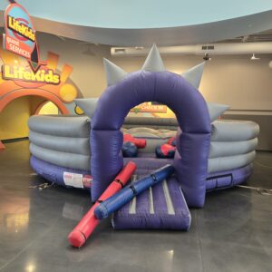 Inflatable jousting arena setup by Jumpers4You – Omaha bounce house delivery experts
