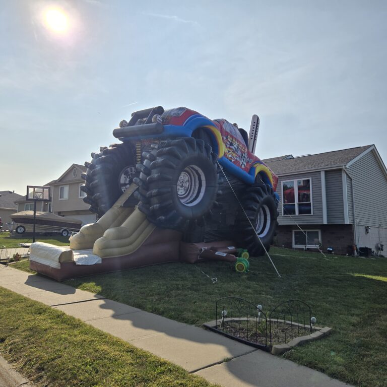 HOA and Block Party Rentals Omaha – monster truck inflatable slide at a neighborhood house party