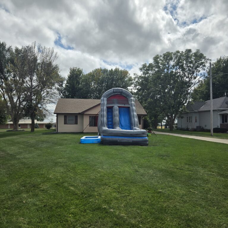 HOA and Block Party Rentals Omaha – inflatable water slide set up on front lawn in residential neighborhood