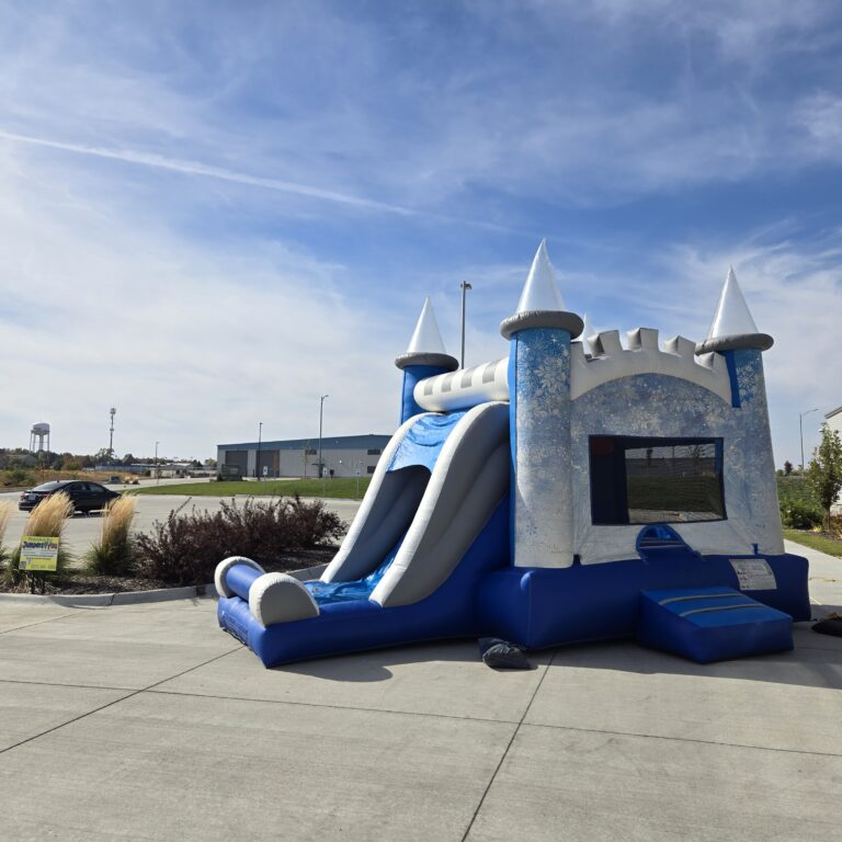 Church rentals Omaha bounce house and slide combo set up for a church event
