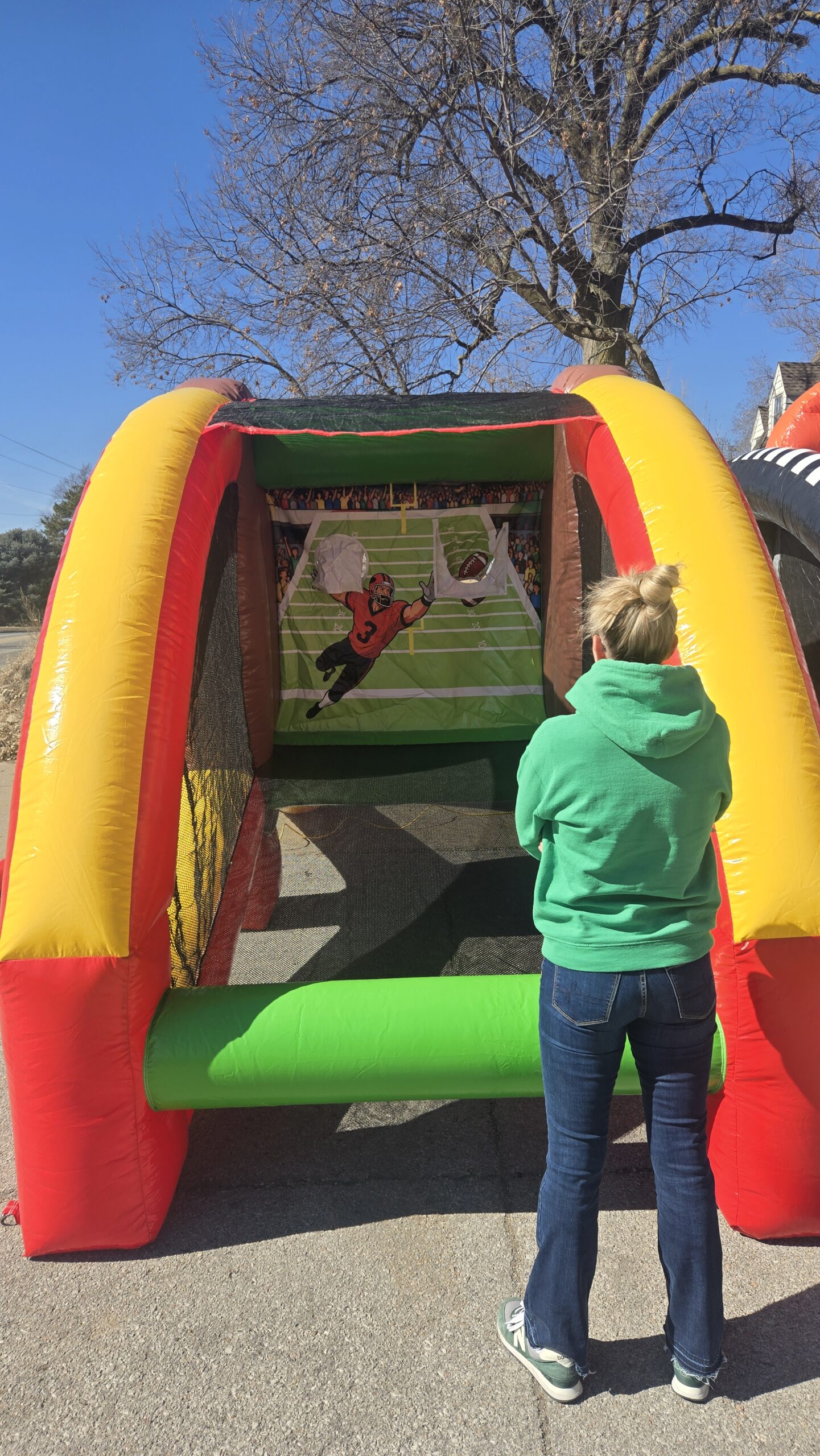 Older kids birthday party games Omaha football toss rental