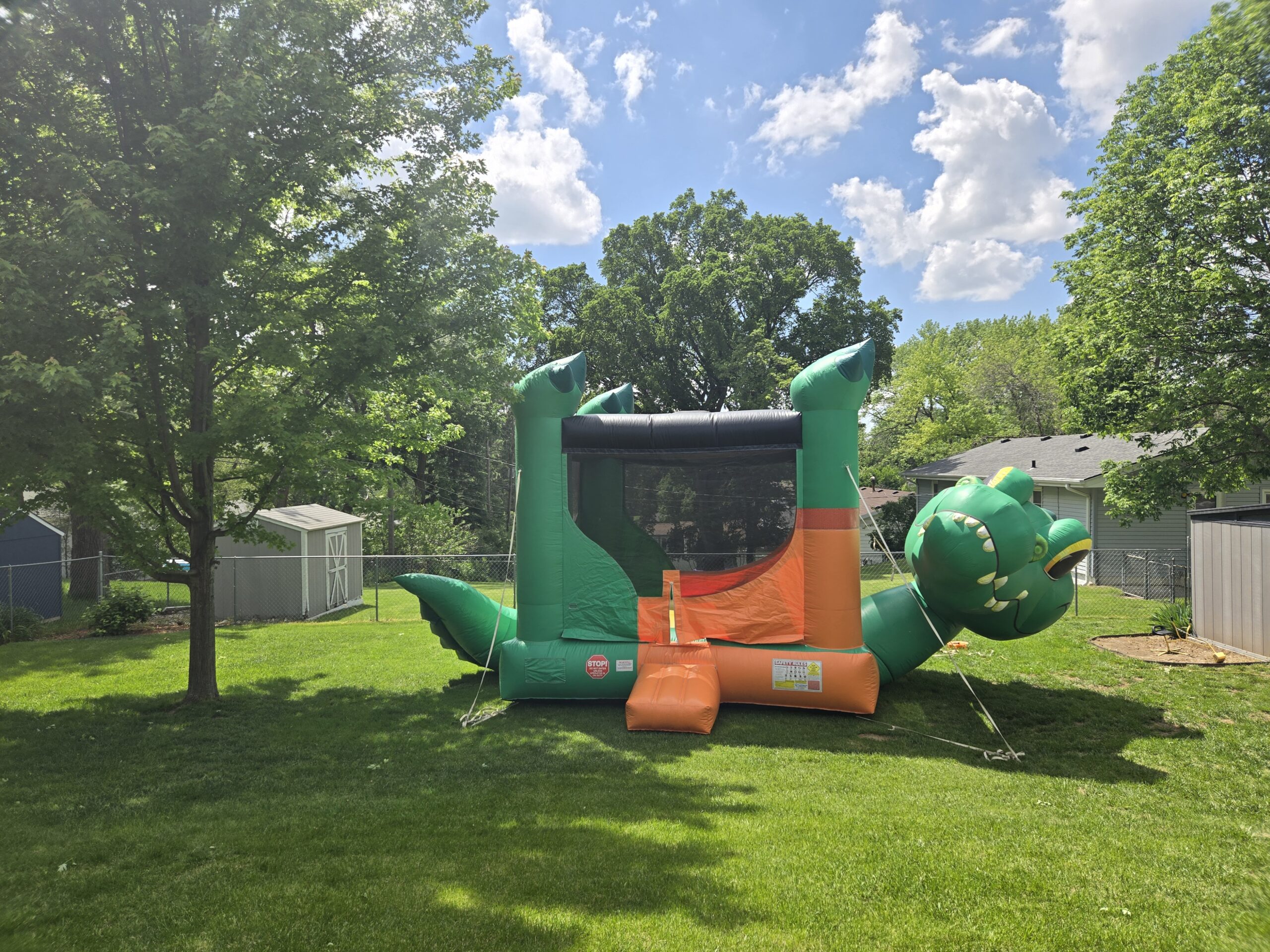 Omaha Kids Party Rentals crocodile bounce house set up outdoors